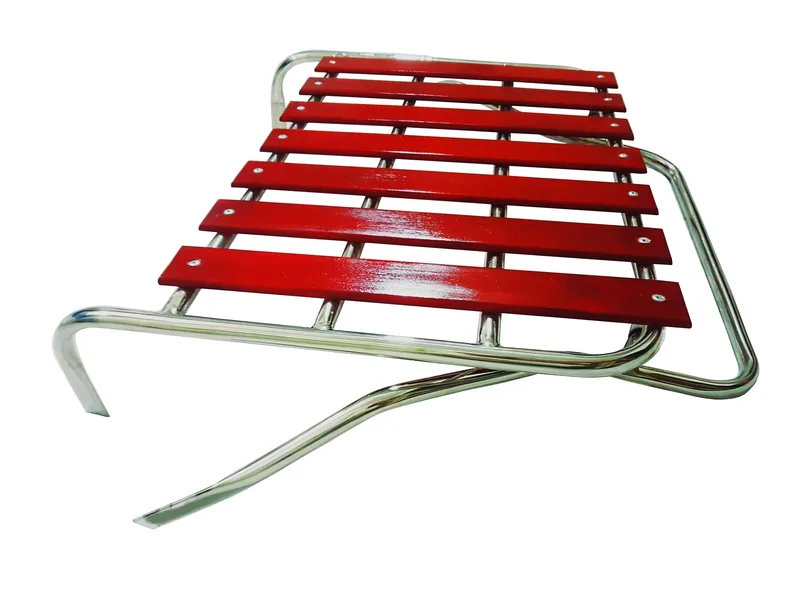 Chrome deck-lid rack with red slats isolated at a front angle